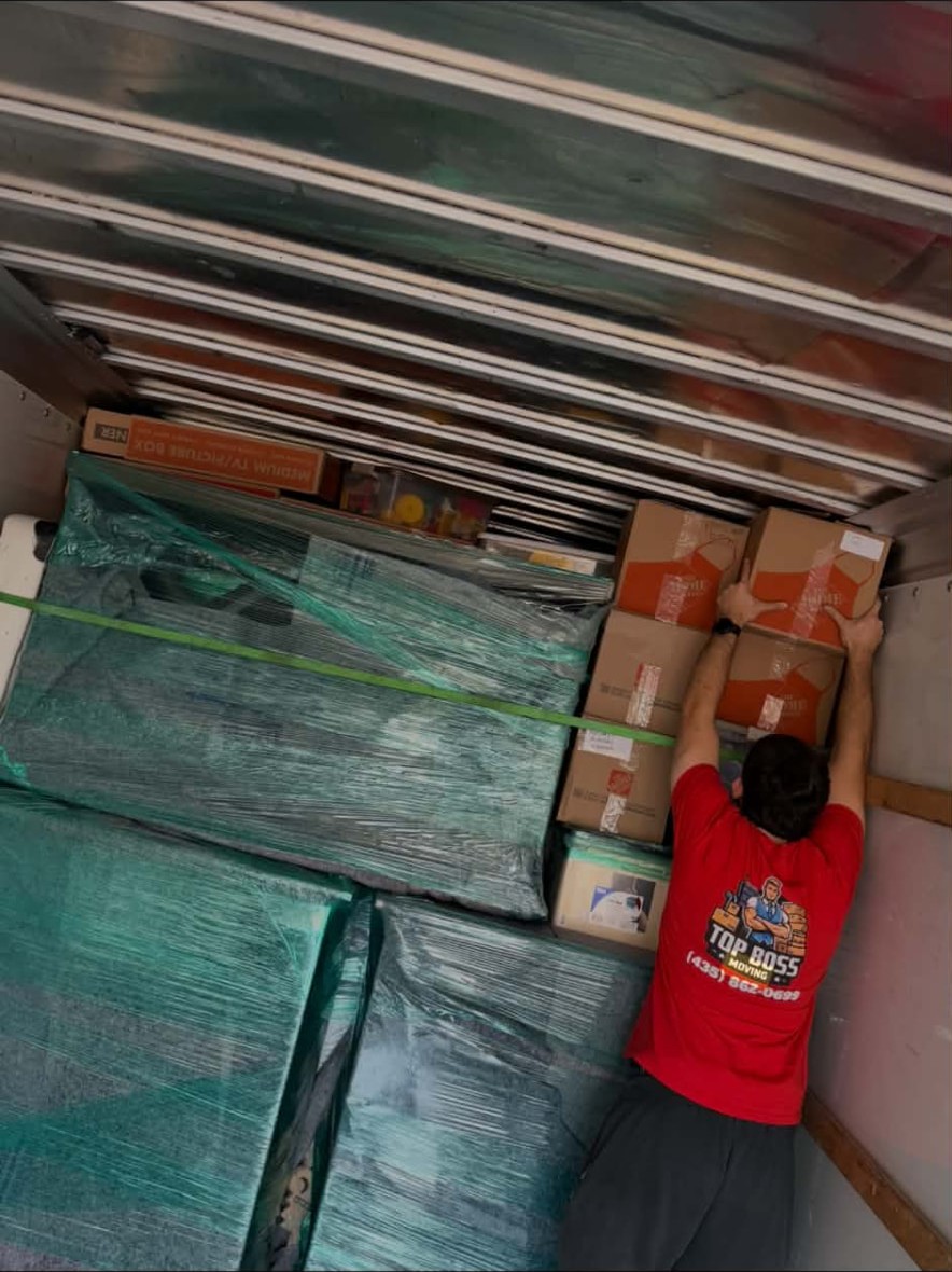 Protected belongings stacked inside the moving truck