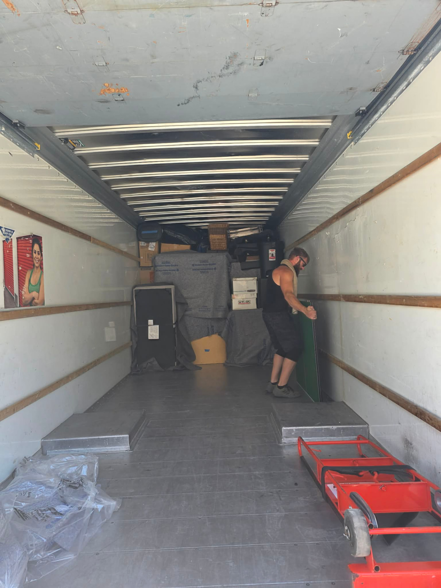 Top Boss mover working inside the truck